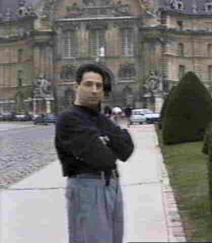 Novelist David Alexander poses in front of Invalides in Paris, France.